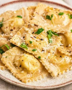 Final plated Learn to make homemade cheese ravioli with this easy recipe! served as a hero shot