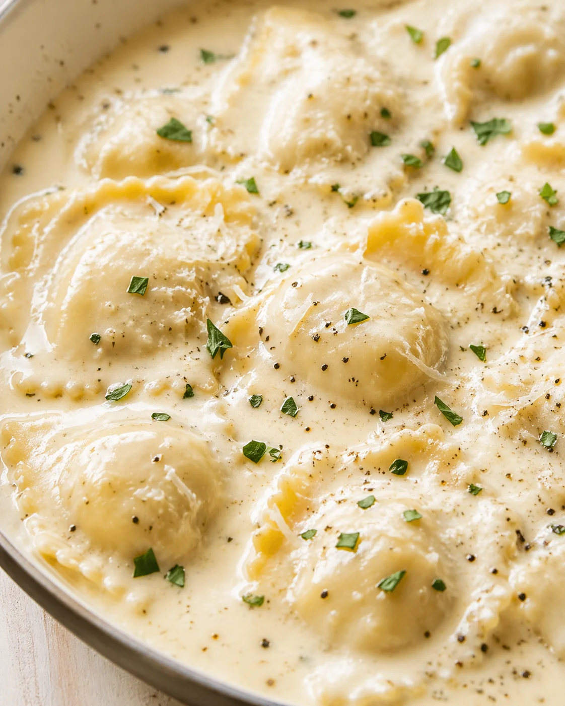 Final plated Creamy Garlic Parmesan Ravioli Sauce 5 Steps Ultimate Delicious served as a hero shot