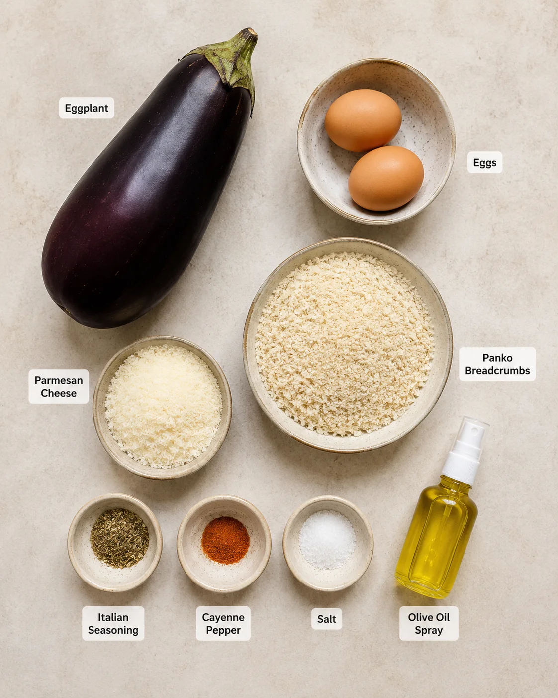 Fresh eggplant, eggs, bread crumbs, and seasonings for crispy fries