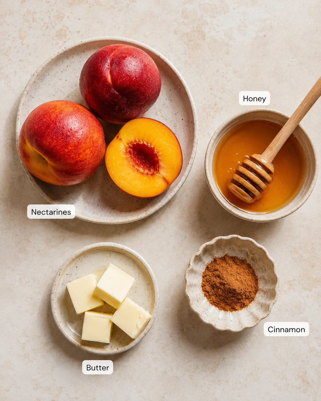 Fresh nectarines with honey, cinnamon, and butter ready for baking