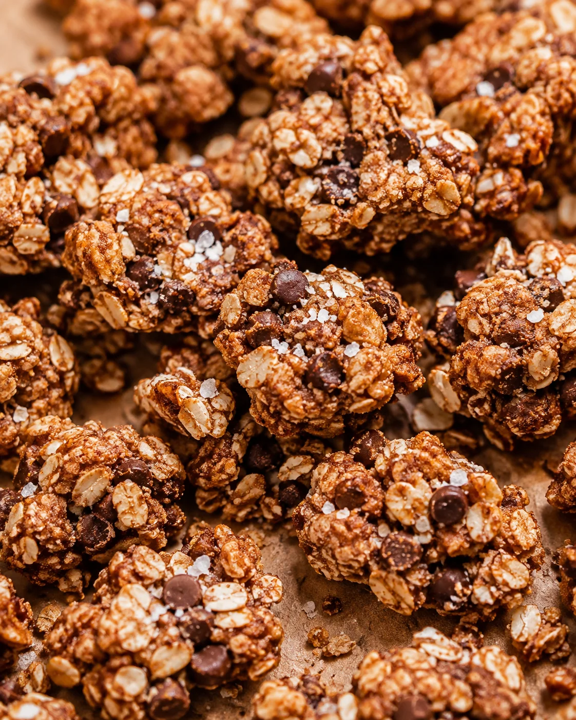Homemade Salted Chocolate Chip Granola Clusters Close-up of crunchy homemade granola clusters with chocolate chips and sea salt