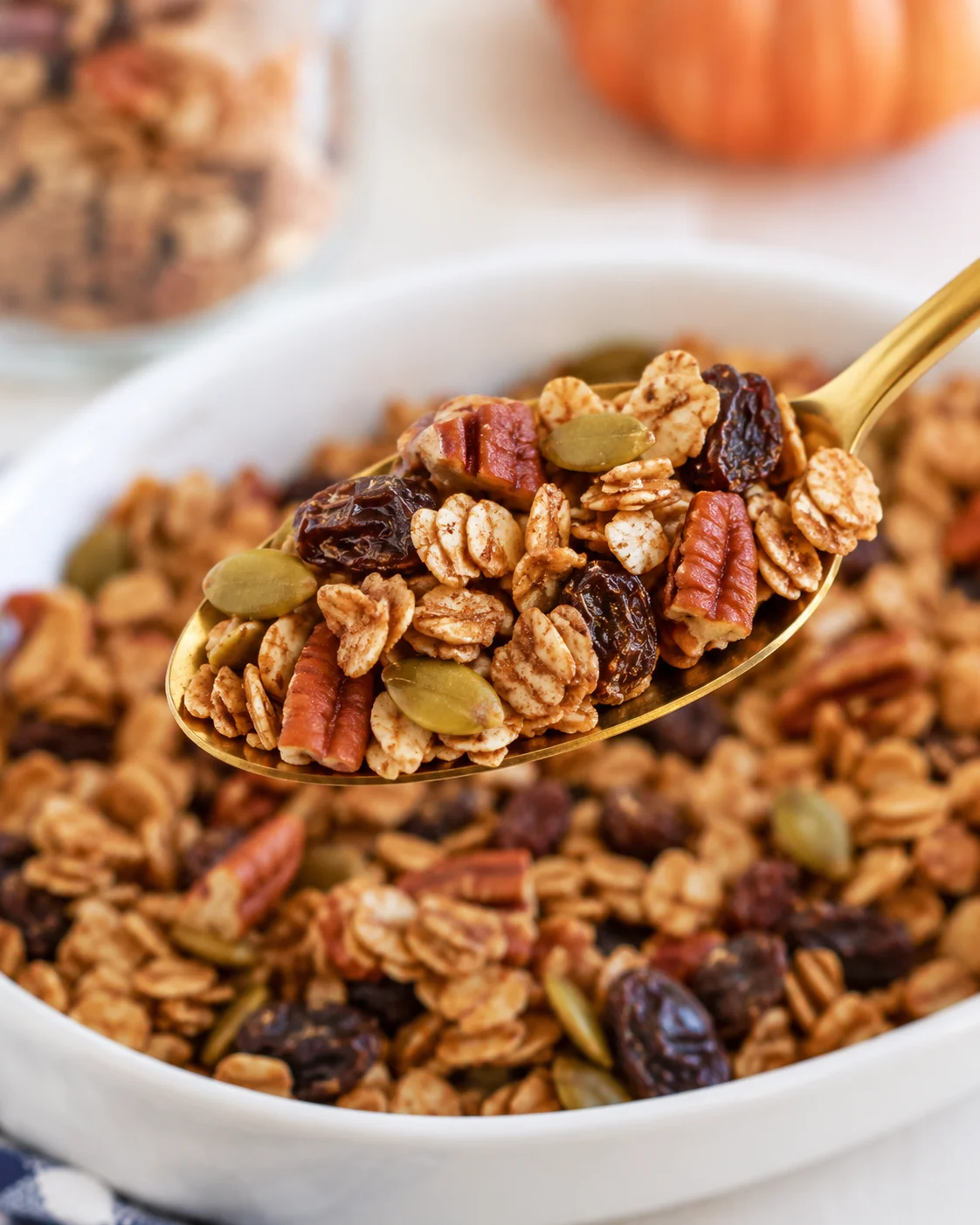 Close-up of crunchy pumpkin spice sourdough granola with nuts and dried fruit